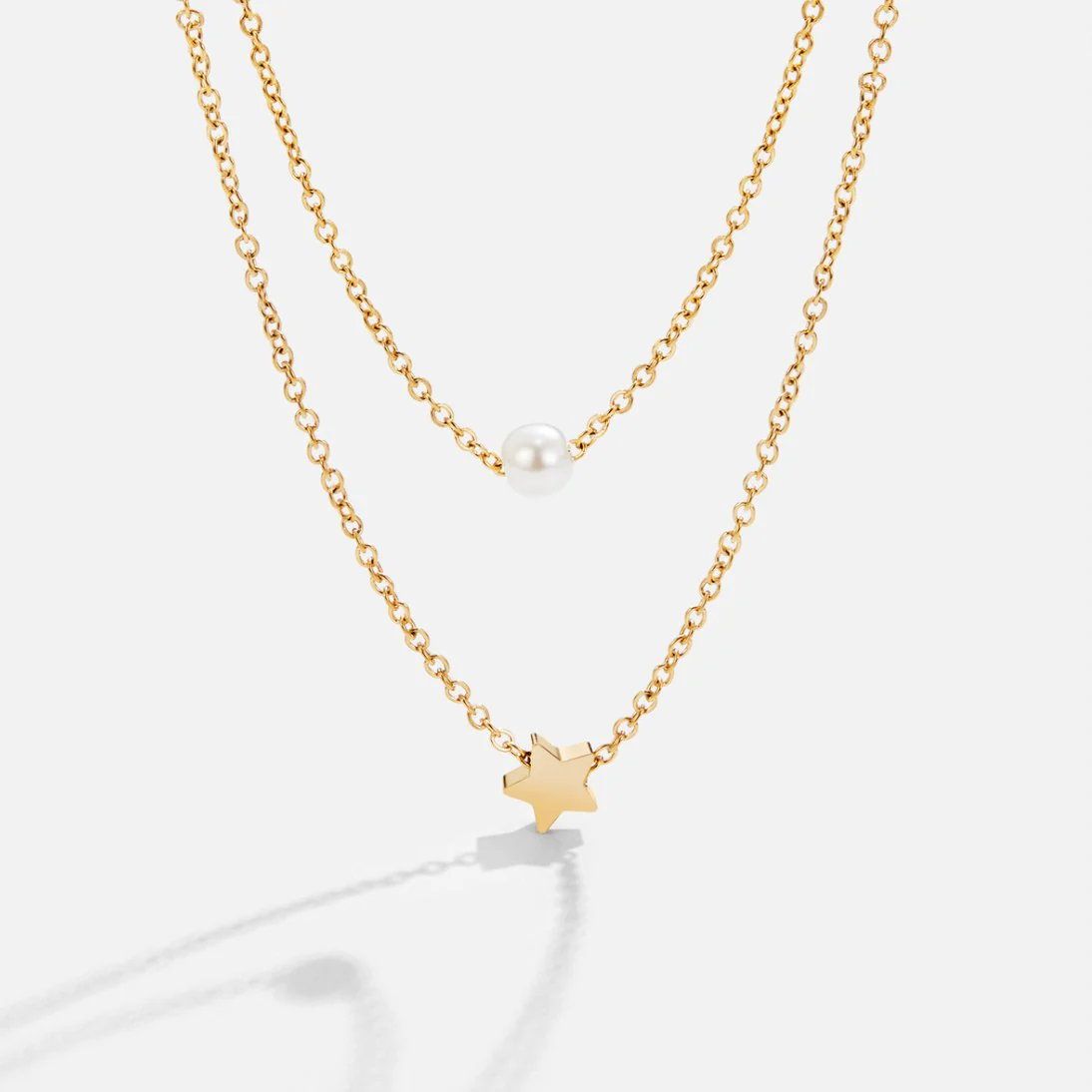 Mehrreihige Halskette mit Goldstern & Perlen